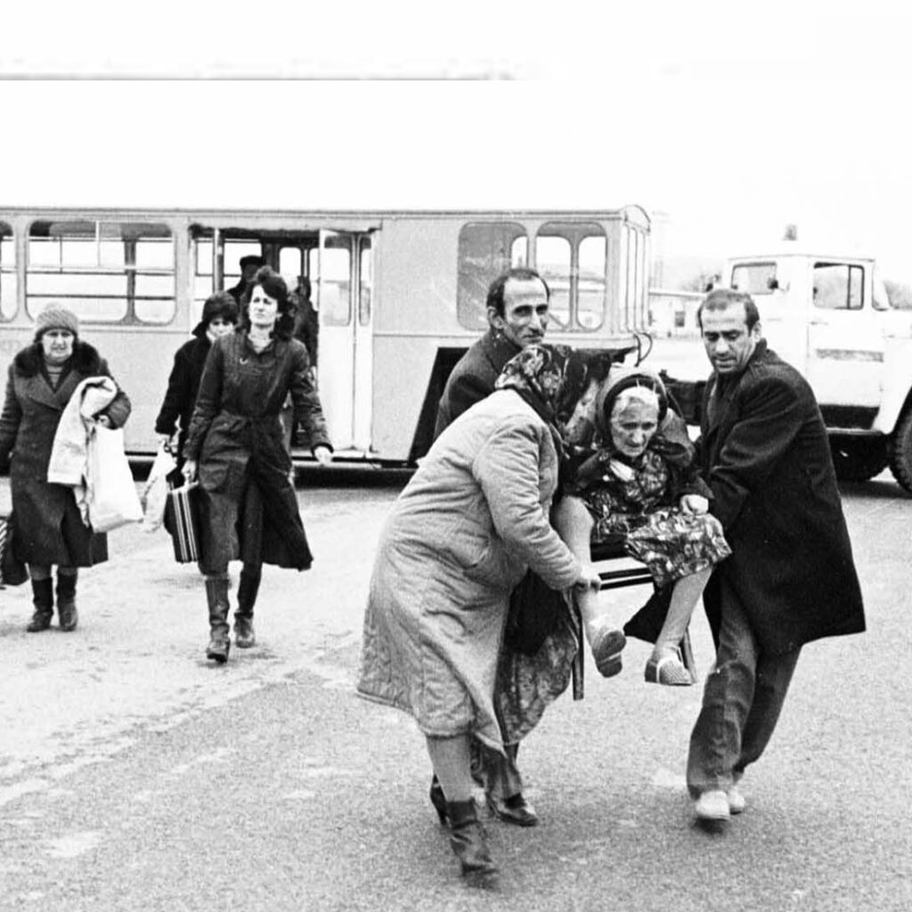 A historical black-and-white photograph showing the aftermath of the Baku Pogroms in January 1990, where Azerbaijani nationalists, with the support of the Azerbaijani SSR government, looted Armenian homes and businesses, murdered civilians, and expelled the Armenian population. The pogroms led to the ethnic cleansing of nearly 500,000 Armenians from Azerbaijan, marking a tragic chapter in modern ethnic violence.