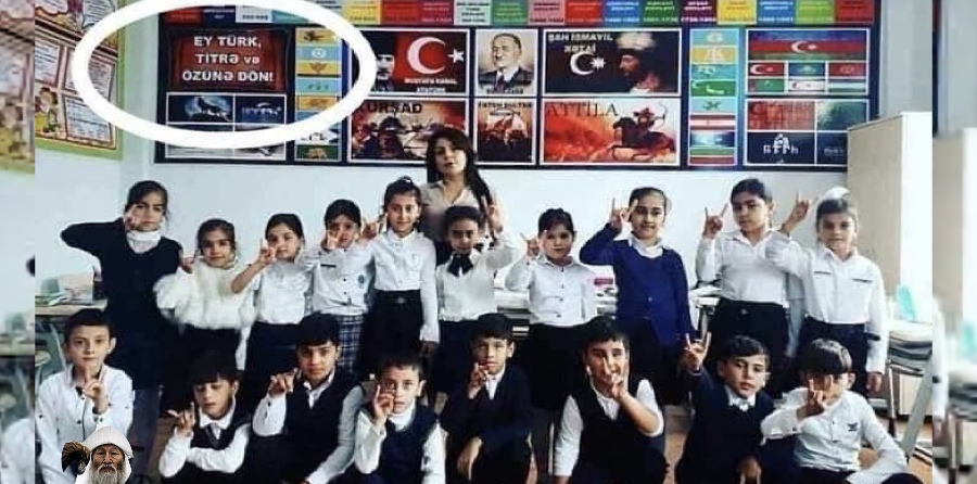 A group of Azerbaijani schoolchildren posing with the Grey Wolf hand sign beneath ultranationalist Turkish slogans and pan-Turkic propaganda posters.